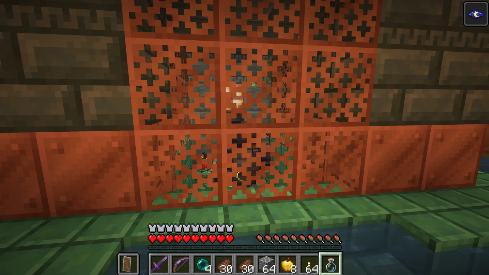 The suited man standing behind copper grates near the Ominous Vault