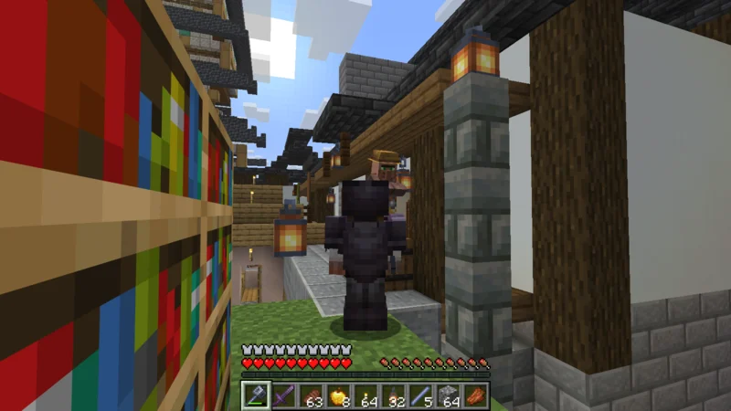 The castle-town shopping street with storage buildings and shops connected by a stone-paved road