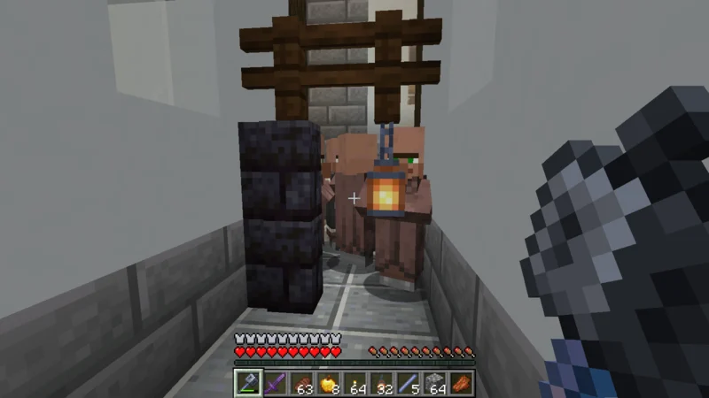 Looking closely at villagers gathered in a passage inside the residence