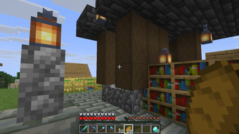 A village well and house beside a lantern