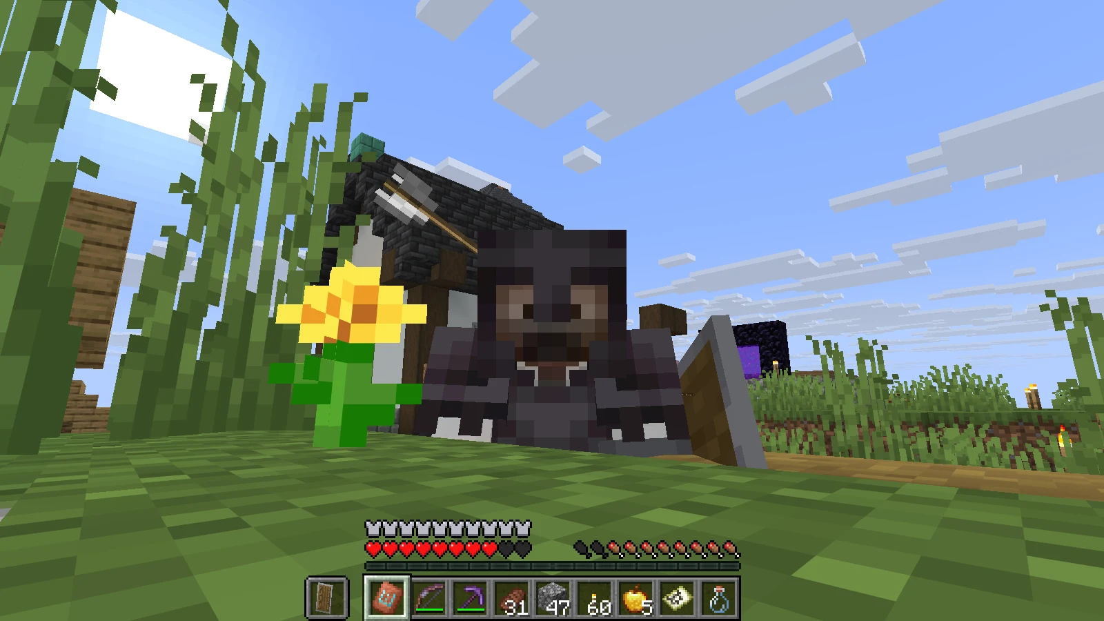 The suited man bowing in the village while wearing full Netherite armor