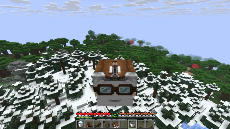 A snowy mountain and forest seen from a Happy Ghast above