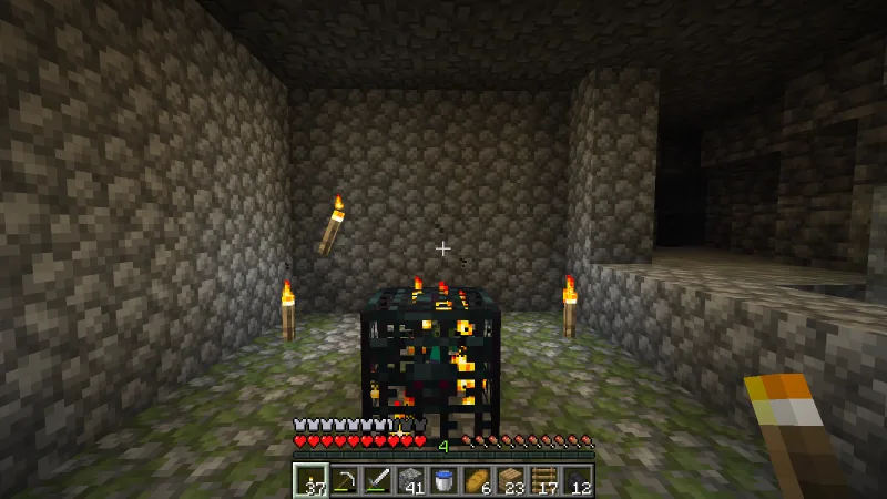 Finding a zombie spawner in a mossy cobblestone dungeon Finding a zombie spawner in a mossy cobblestone dungeon