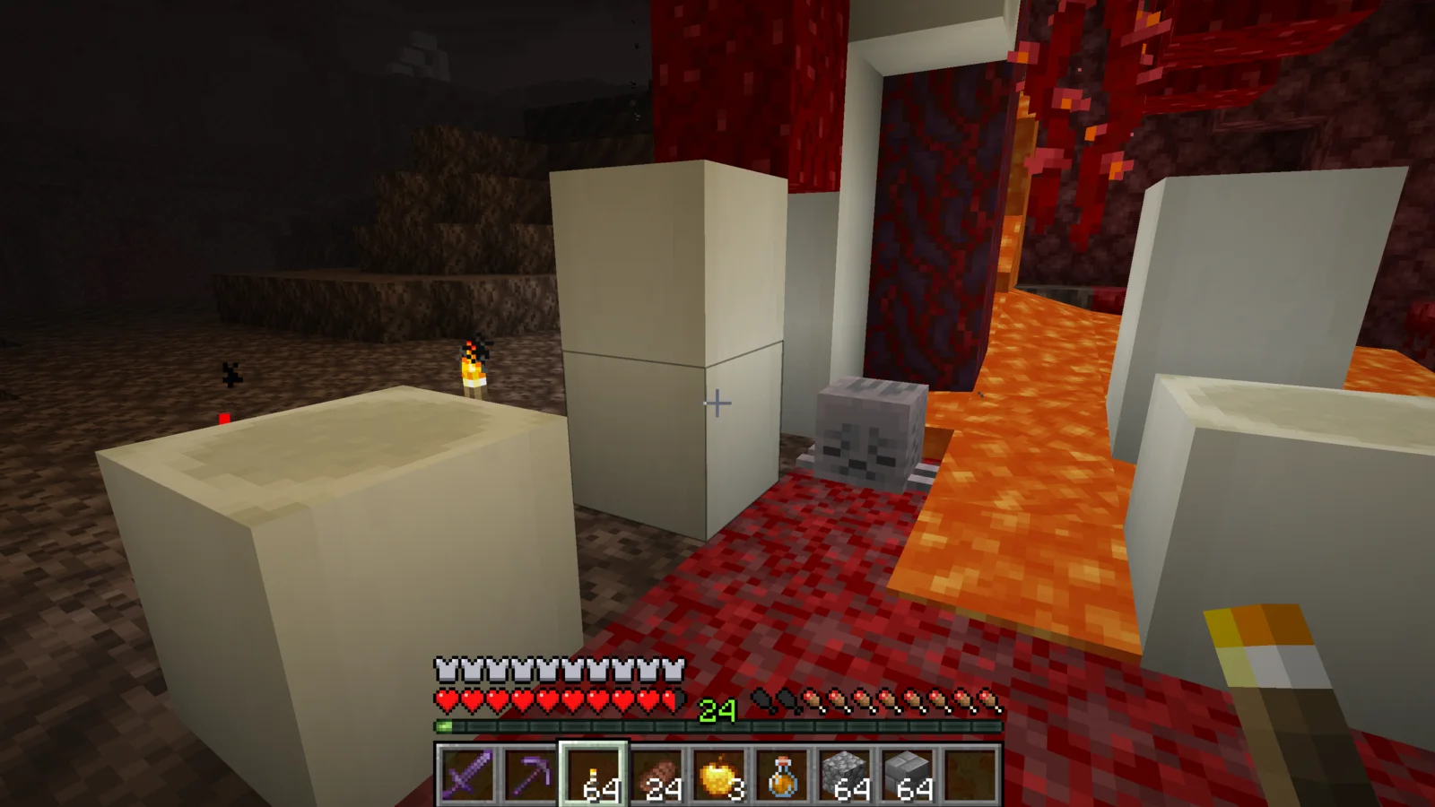 A Dried Ghast embedded between the Bone Blocks of a Nether Fossil
