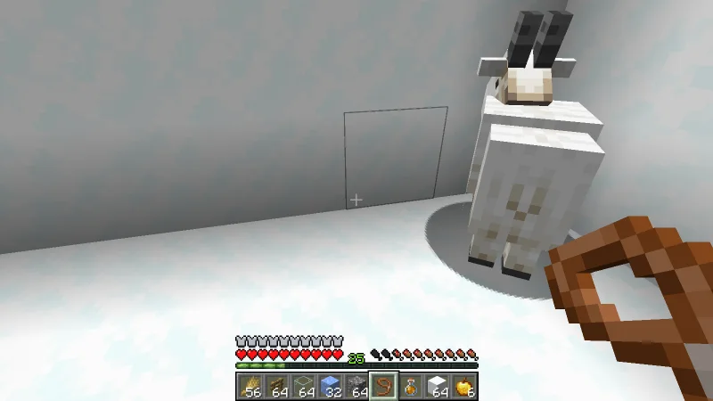 The screaming goat inside an enclosure made from snow blocks and glass