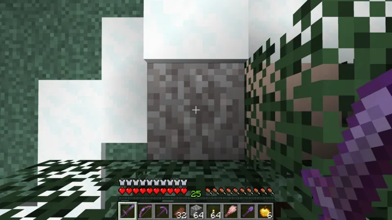 A mottled block of suspicious gravel exposed in a snowy taiga