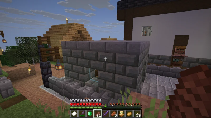 The completed cartographer workshop built with tuff bricks and stone bricks