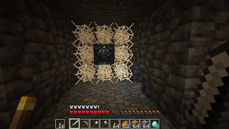 A cave spider spawner surrounded by dense cobwebs A cave spider spawner surrounded by dense cobwebs