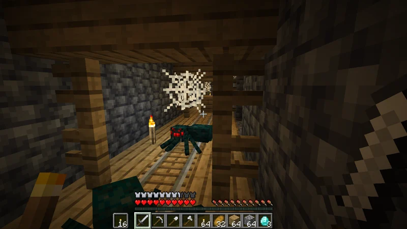 Facing a Cave Spider through the cobwebs inside the mineshaft Facing a Cave Spider through the cobwebs inside the mineshaft