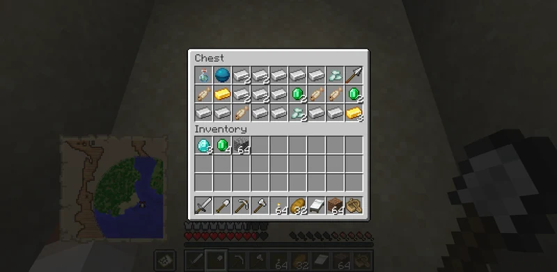 The buried treasure chest containing the Heart of the Sea and several ores