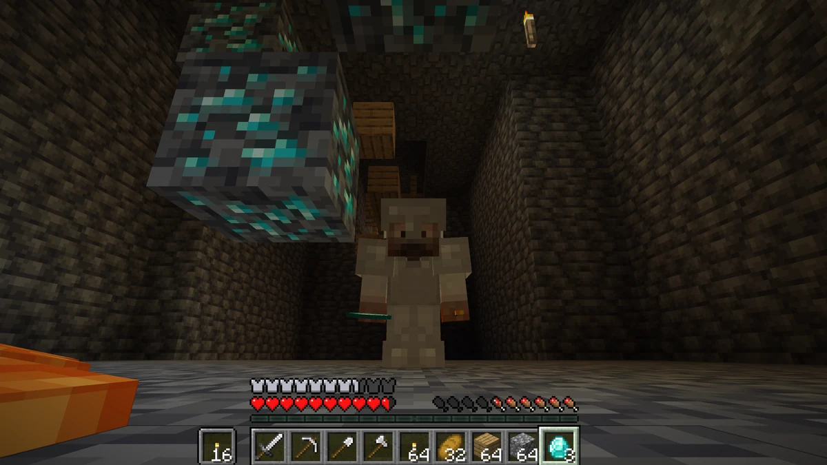 The suited man holding a diamond deep inside the mineshaft