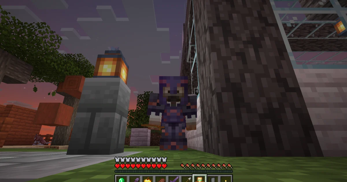 A suited man in netherite armor holding a Totem of Undying in the castle town at dusk