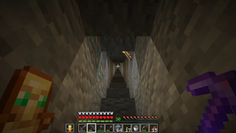 Looking back up the underground staircase lit by torches Looking back up the underground staircase lit by torches