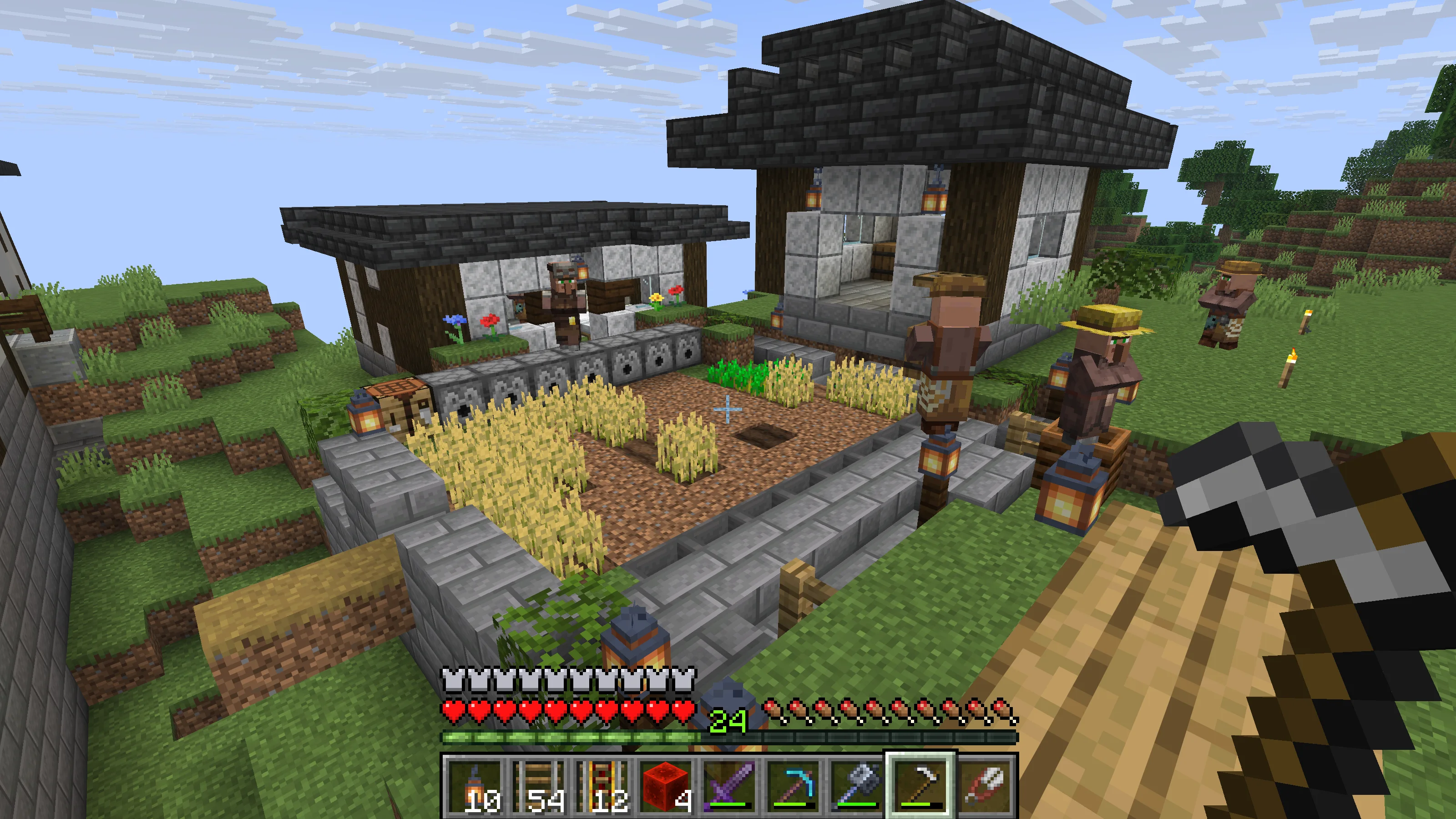 The wheat farm with stone-brick paths and lanterns The wheat farm with stone-brick paths and lanterns