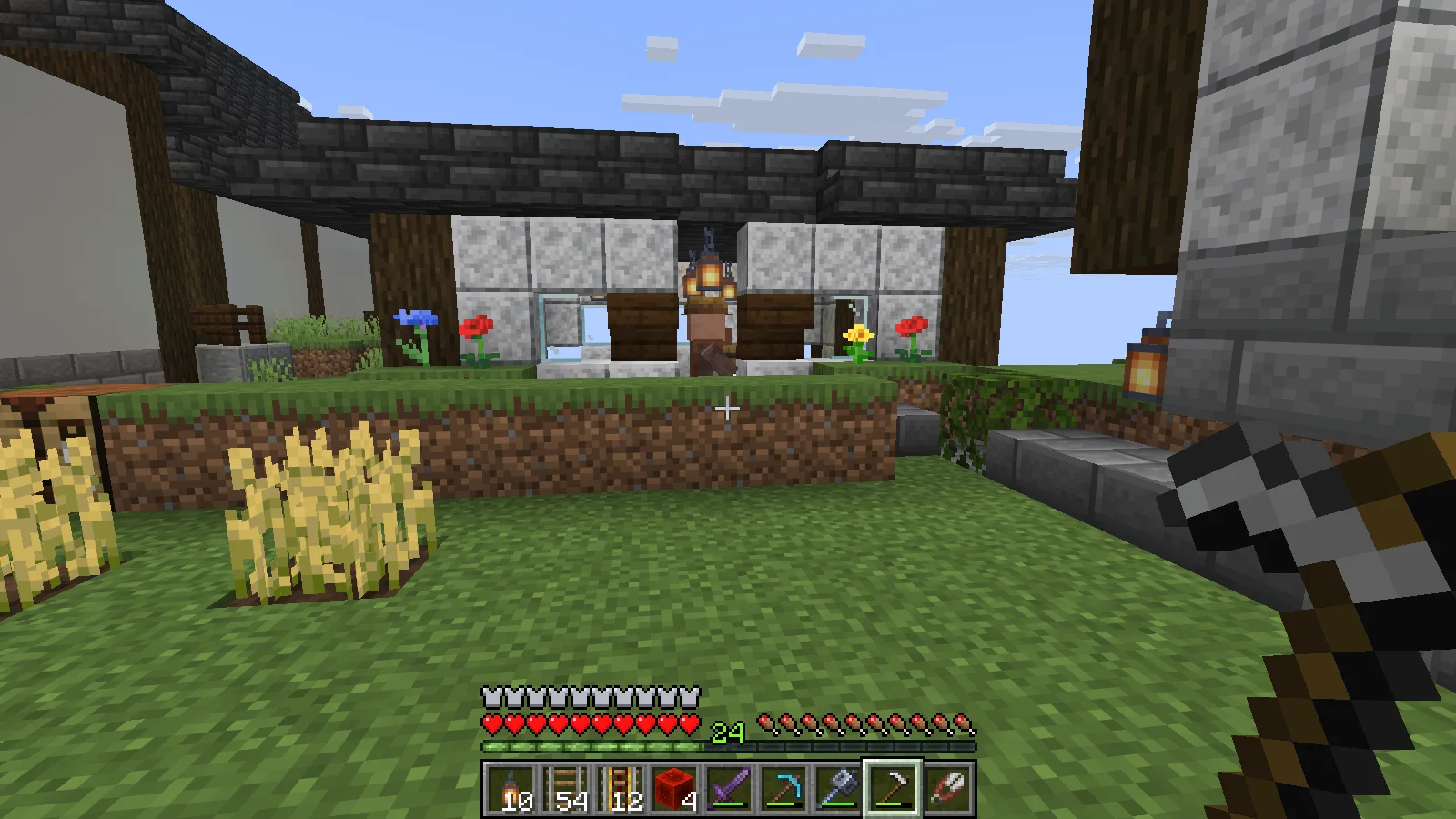 The villager lodging with white walls and a dark roof The villager lodging with white walls and a dark roof
