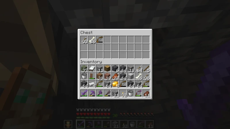 A collection chest holding arrows, bones, and a bow A collection chest holding arrows, bones, and a bow