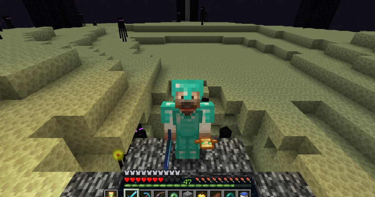 A suited adventurer standing on bedrock in the End, with Endermen on the island behind him A suited adventurer standing on bedrock in the End, with Endermen on the island behind him