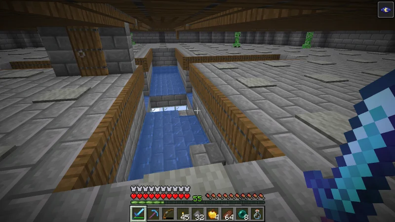 The inside of the farm with creepers on the floor and a water channel leading to the center The inside of the farm with creepers on the floor and a water channel leading to the center
