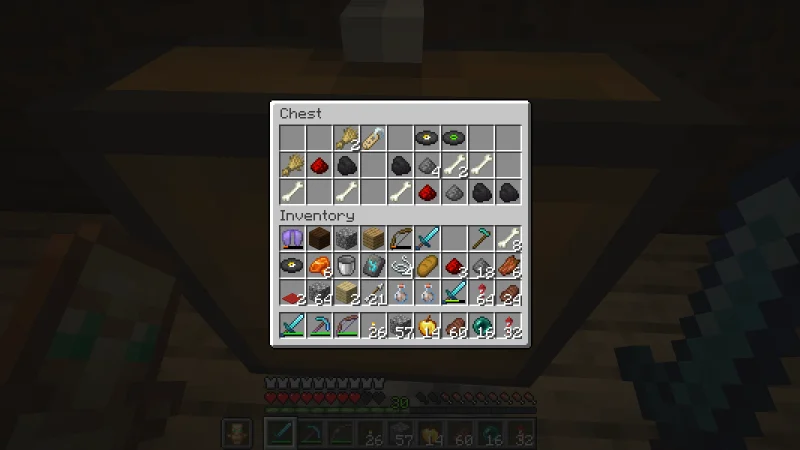 A loot chest showing wheat, coal, bones, and records A loot chest showing wheat, coal, bones, and records