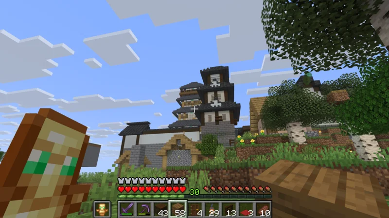The castle keep rising beyond the houses of the northern village The castle keep rising beyond the houses of the northern village