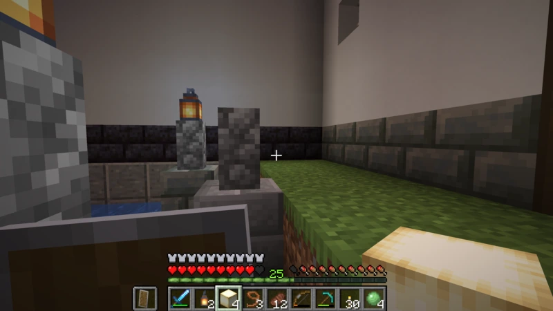Holding a froglight beside the shaft of a second stone lantern on the northern bank