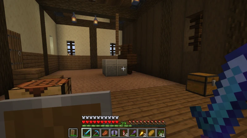 The bright plank-floored workshop, crafting table, and millstone beneath hanging lanterns The bright plank-floored workshop, crafting table, and millstone beneath hanging lanterns